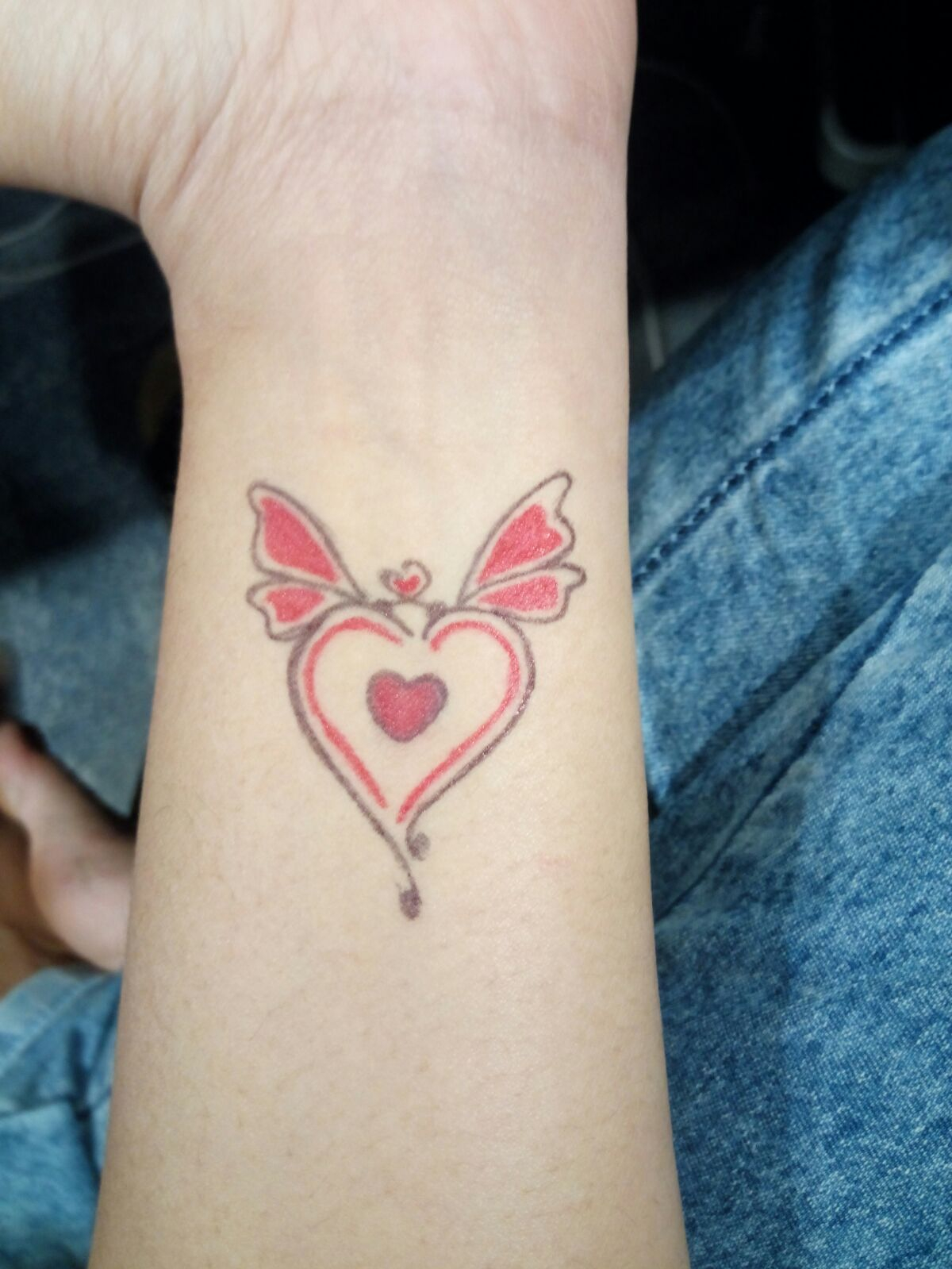 Red Heart And Butterfly Tattoo On The Wrist Simple And Cute Tattoo within dimensions 1200 X 1599