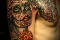 Santa Muerte With Mexican Sugar Skulls Tattoo On Arm And Chest for size 800 X 1098