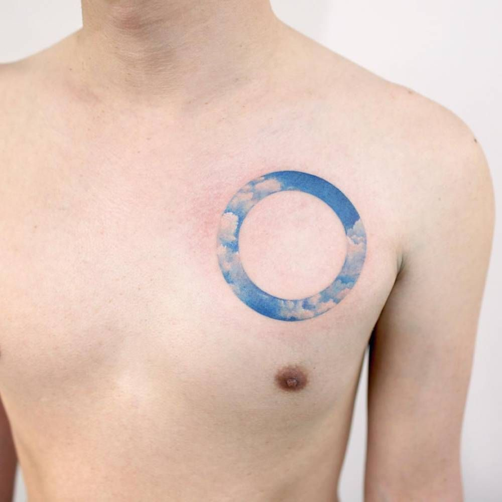 Sky Circle Tattoo On The Chest Tattoo Artist Doy Circle Tattoo throughout dimensions 1000 X 1000