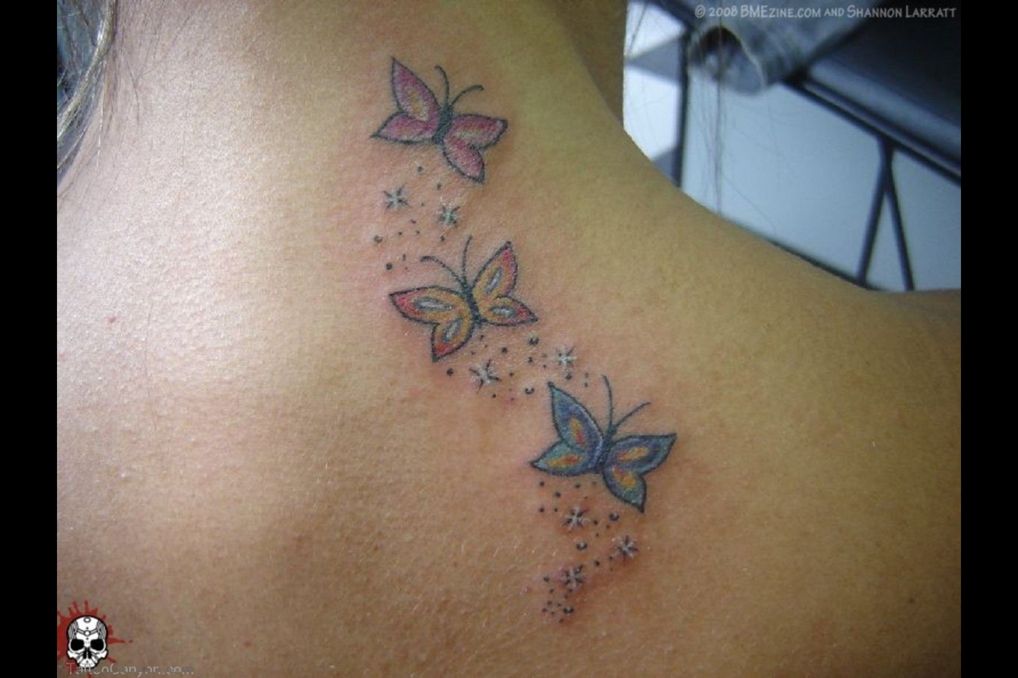 Small Butterfly Flying Tattoos Butterfly And Flower Vine Tattoo within proportions 2000 X 1333