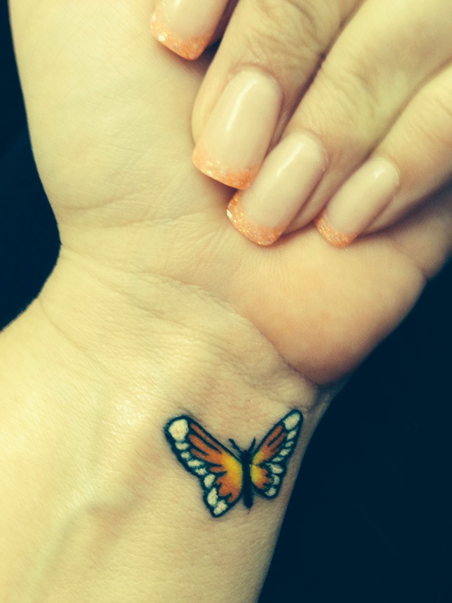 Small Butterfly Tattoo On Wrist Bright Colors Tattoos in size 1536 X 2048