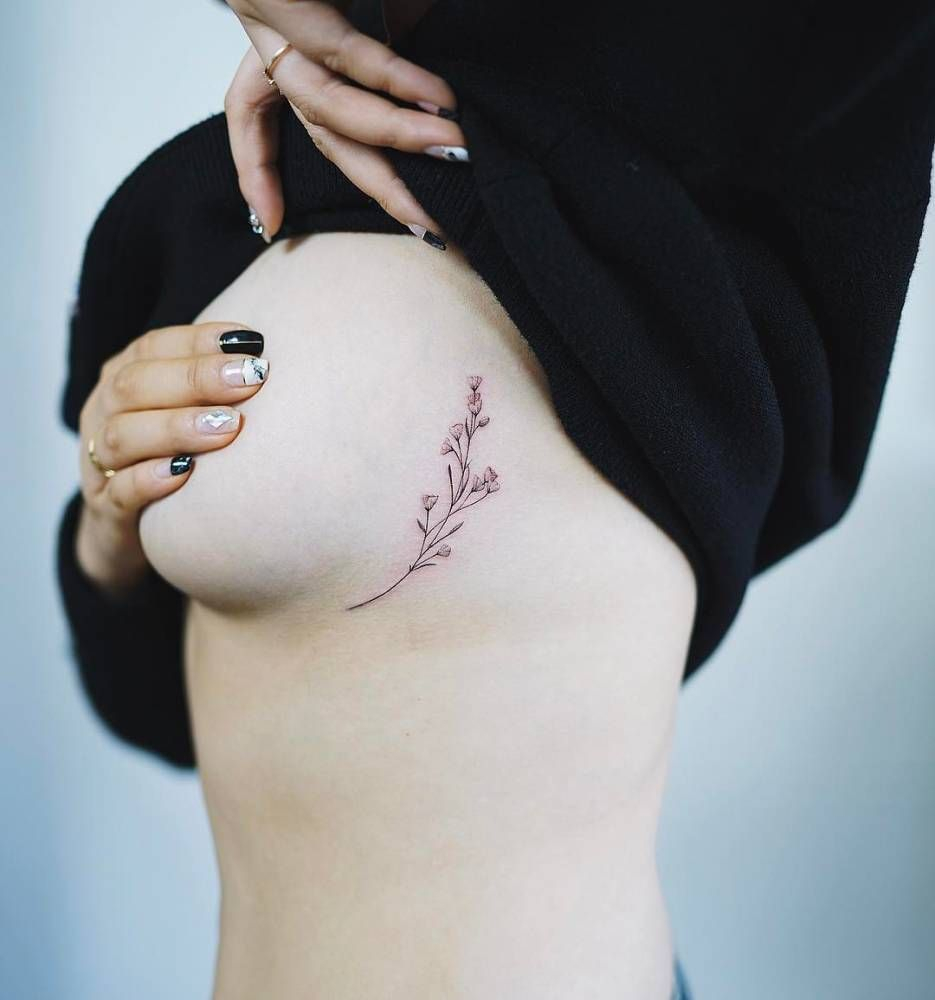 Small Mistletoe Under The Chest Tattoo Artist Nando Tattoos with regard to measurements 935 X 1000