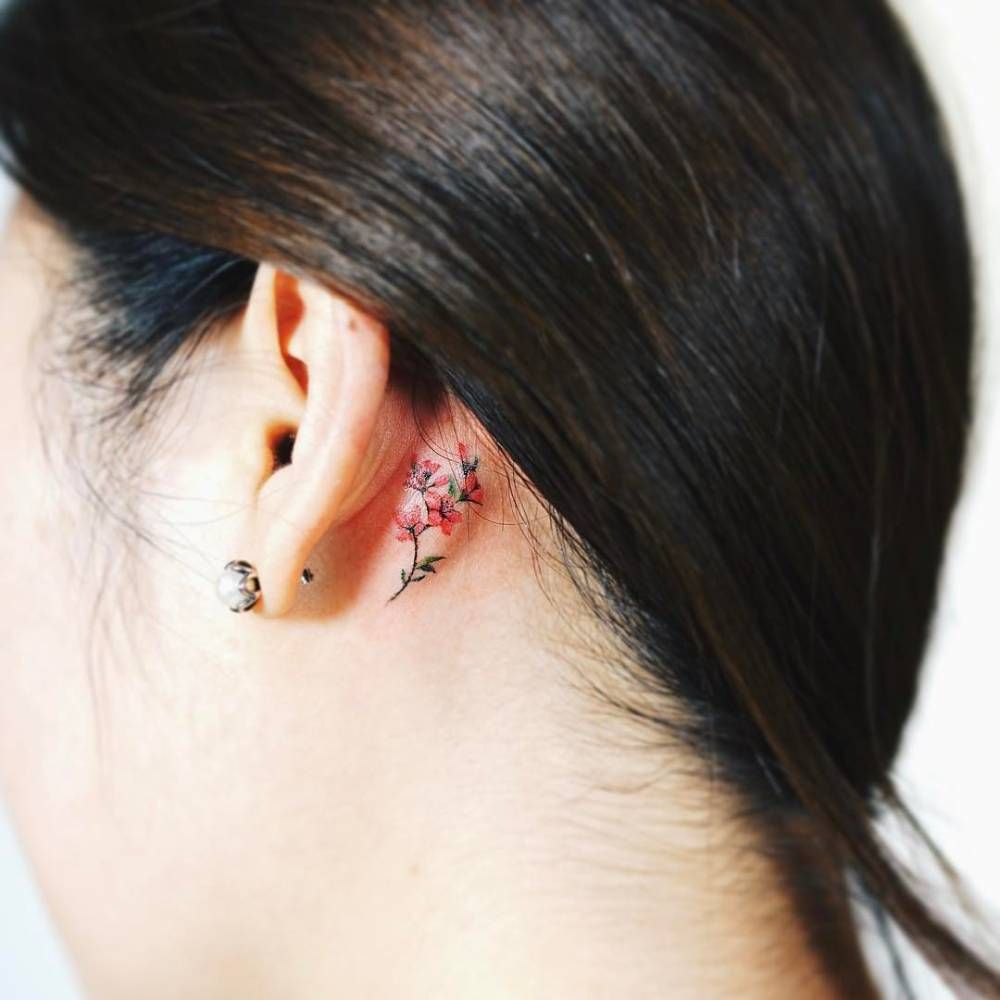 Tiny Flower Tattoo Behind The Left Ear Tattoo Artist Nando intended for size 1000 X 1000
