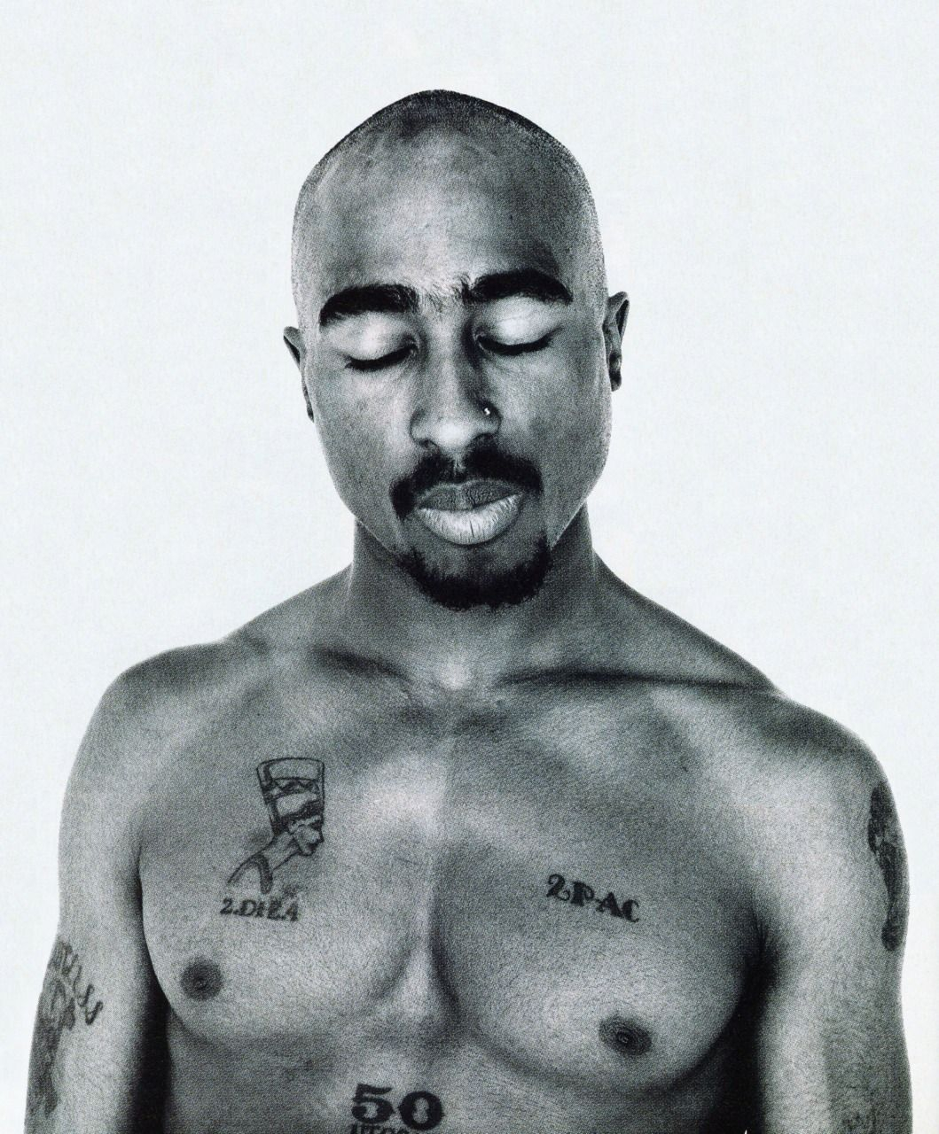 Tupacs Tattoos Are So Famous But Why Meanings Behind Tupacs intended for dimensions 1059 X 1280