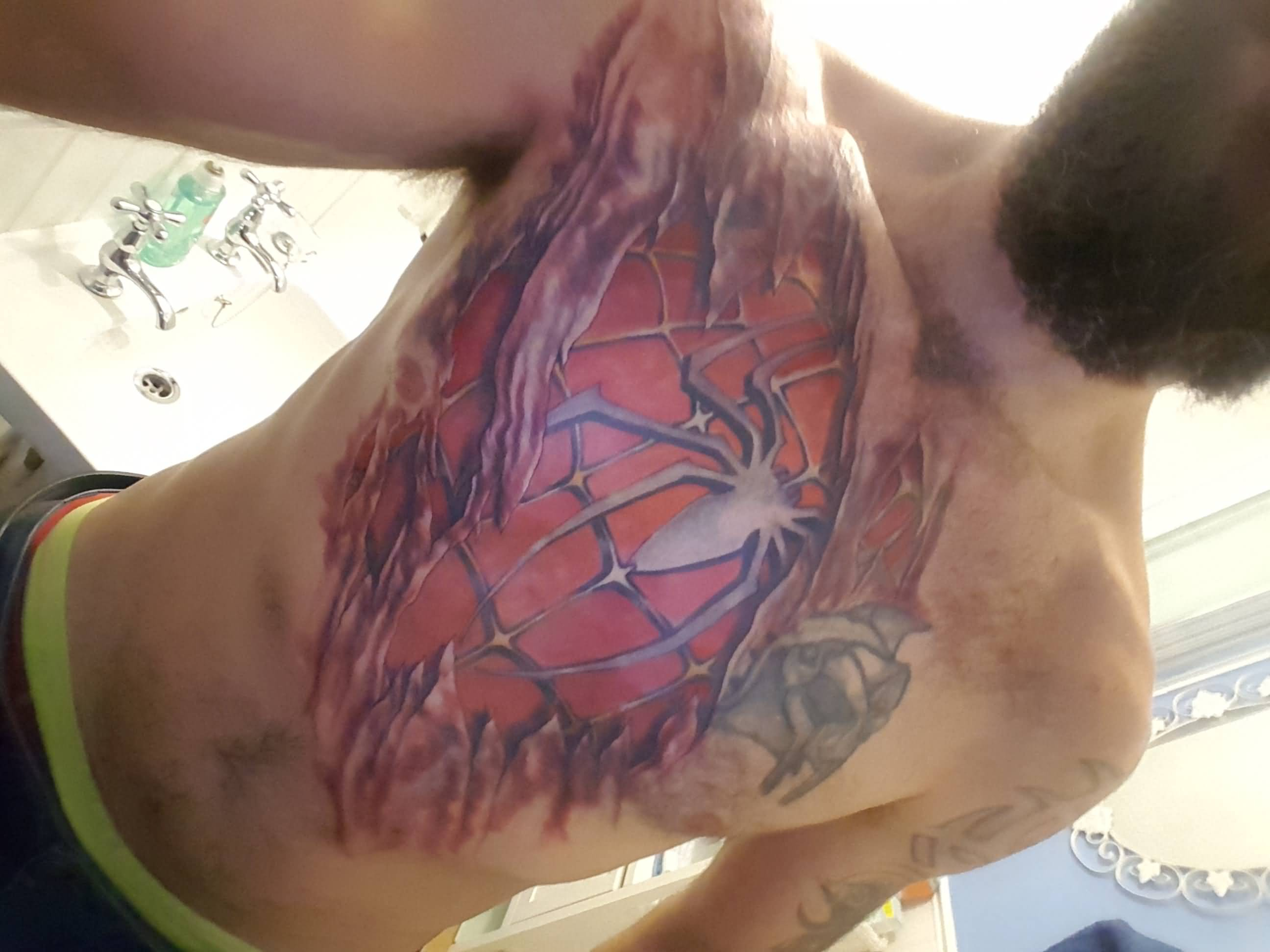 Unfinished Chest Piece Ripped Skin Spiderman Tattoo pertaining to size 2592 X 1944